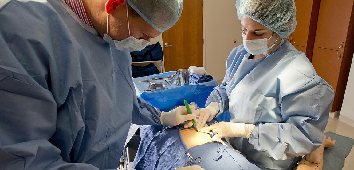 PA students learning in an ER lab